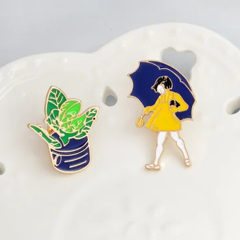 Sarı emaye pin broş Kız şemsiye ve bitki klapa pin Bitki aşığı pin Broş koleksiyonu Küçük kız takı gif